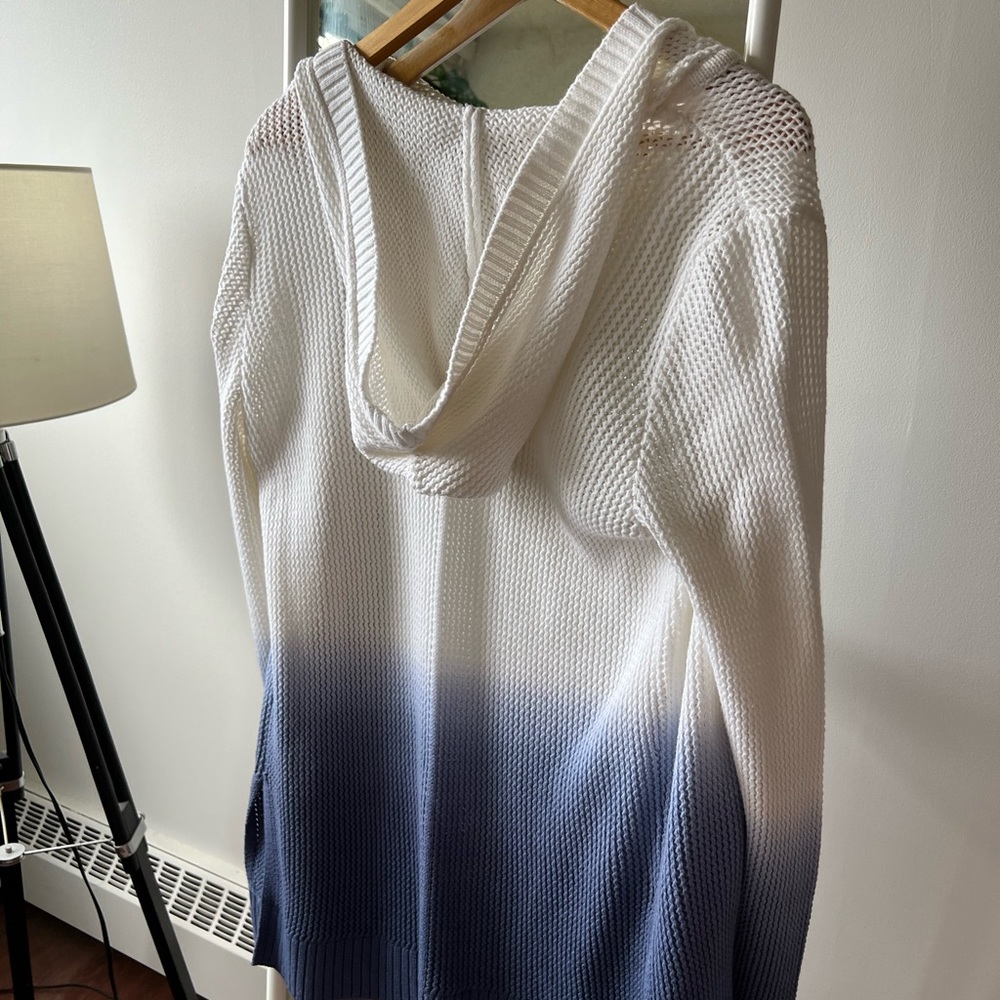 Blue and white ombré open knit cardigan with hood.